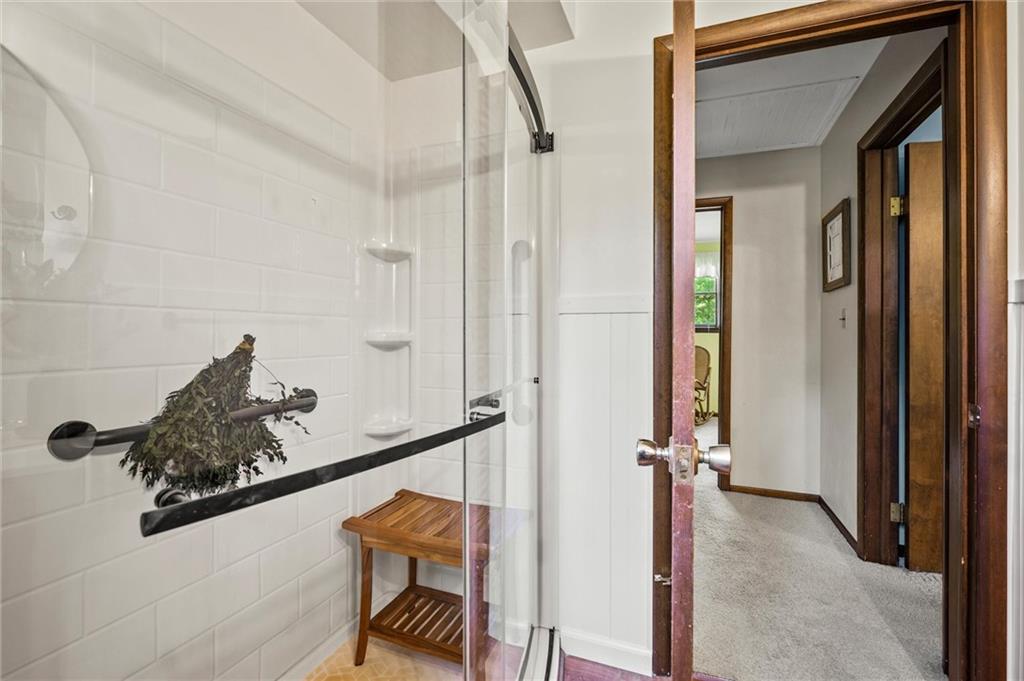 545 Bedford Road West Middlesex, PA 16159 - Photo 12 of 25 a view of a hallway with wooden floor and staircase