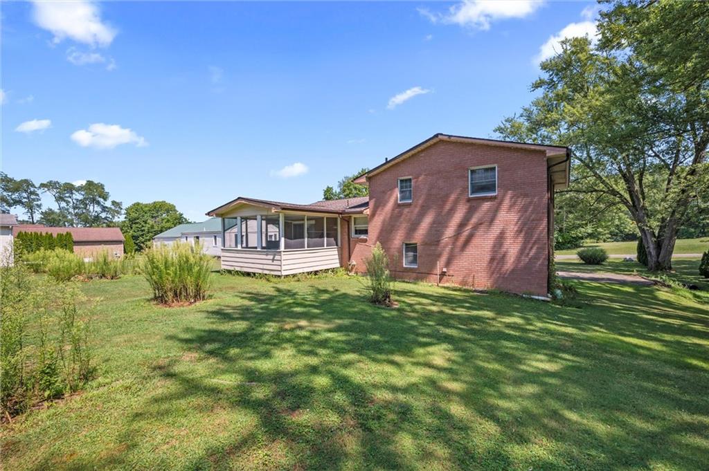 545 Bedford Road West Middlesex, PA 16159 - Photo 17 of 25 a view of a house with a yard