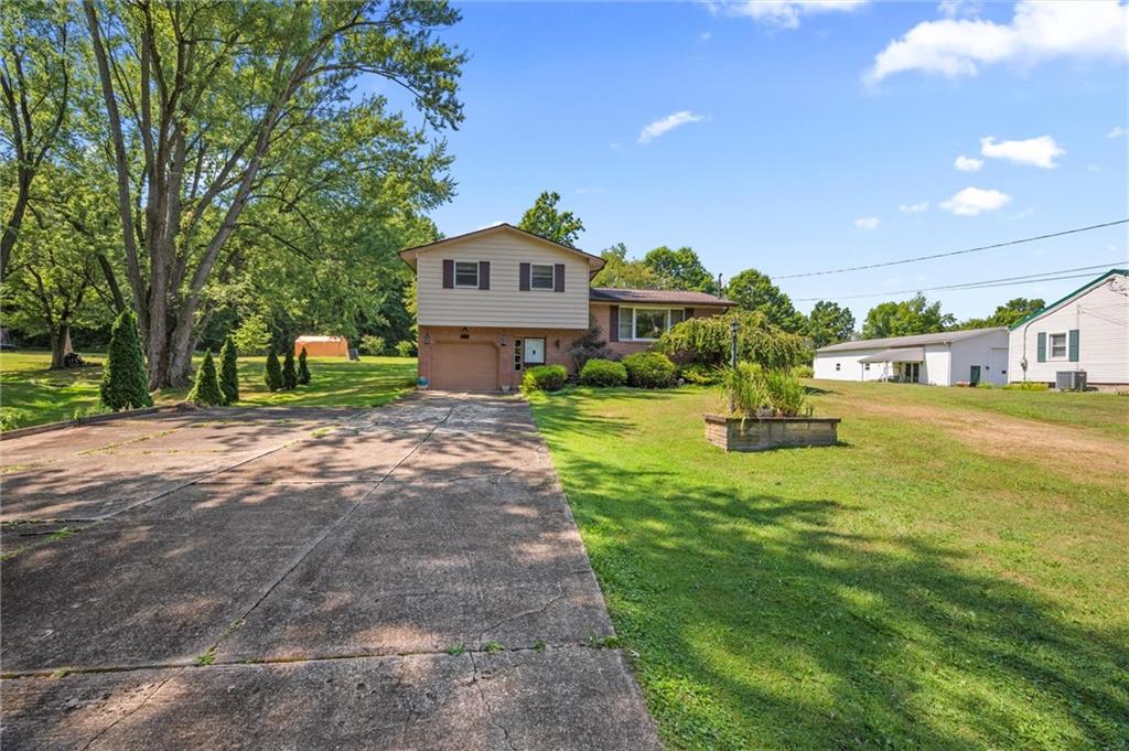 545 Bedford Road West Middlesex, PA 16159 - Photo 22 of 25 a front view of a house with a yard