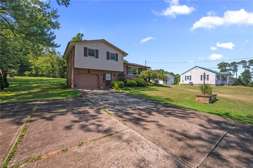 545 Bedford Road West Middlesex, PA 16159 - Photo 23 of 25 a view of a house with a yard