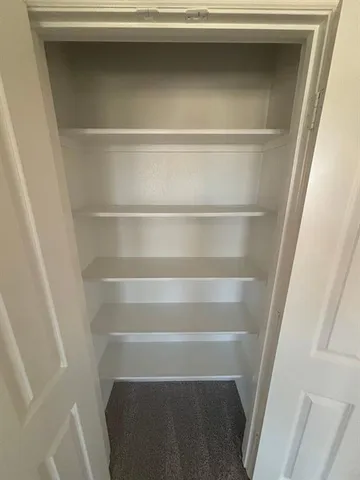 an empty room with a workbench