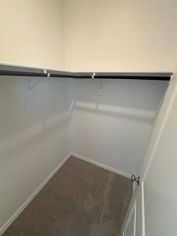 a bathroom with a toilet and a bathtub