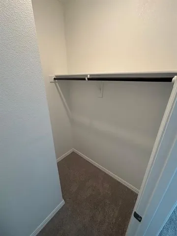 an empty room with a closet