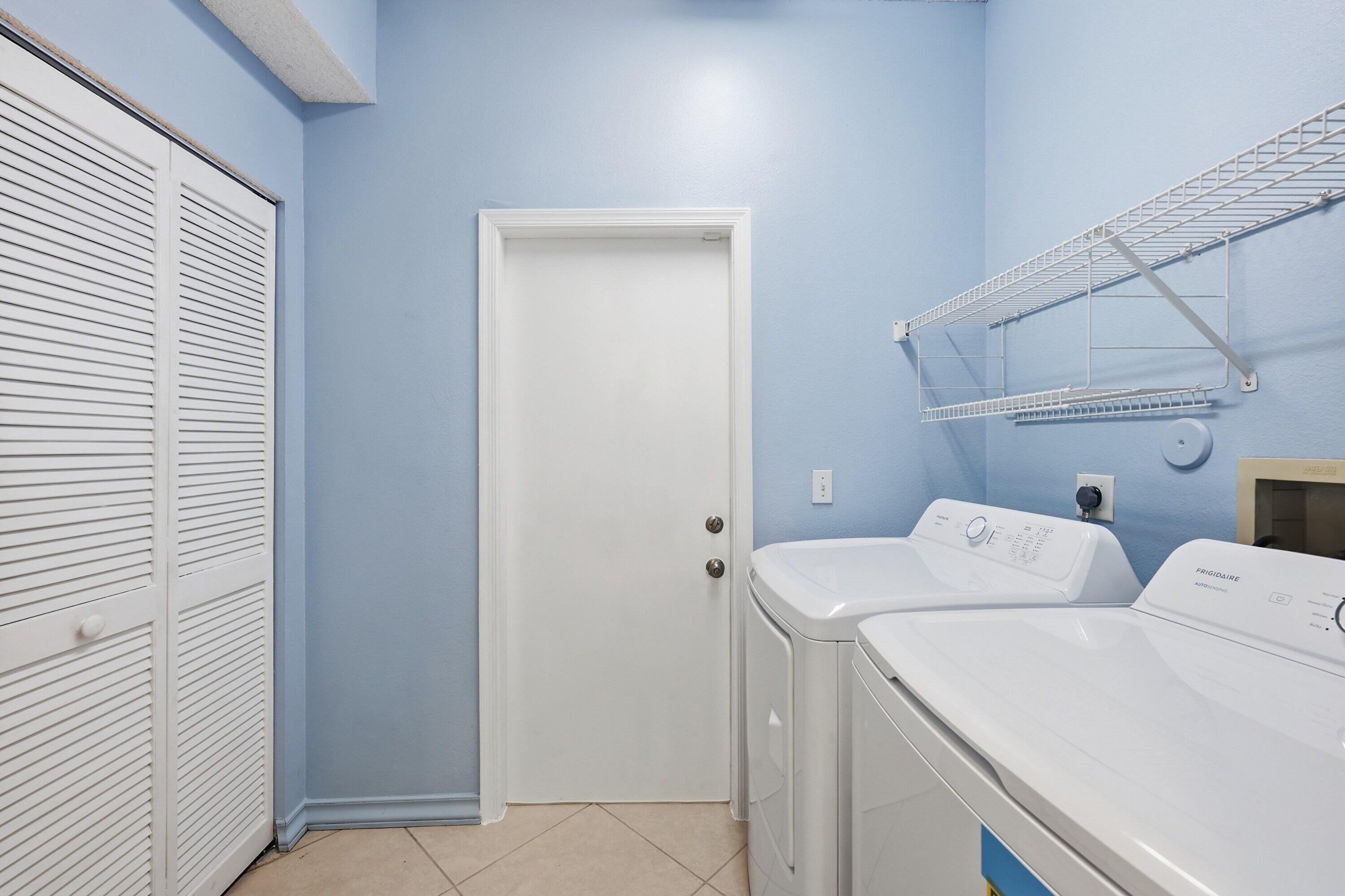 18474 Old Princeton Lane Boca Raton, FL 33498 - Photo 36 of 46 a utility room with dryer and washer