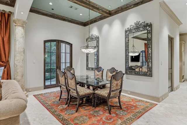 a view of a dinning room with furniture and outdoor space