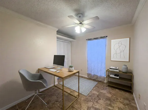a view of an empty room and closet area