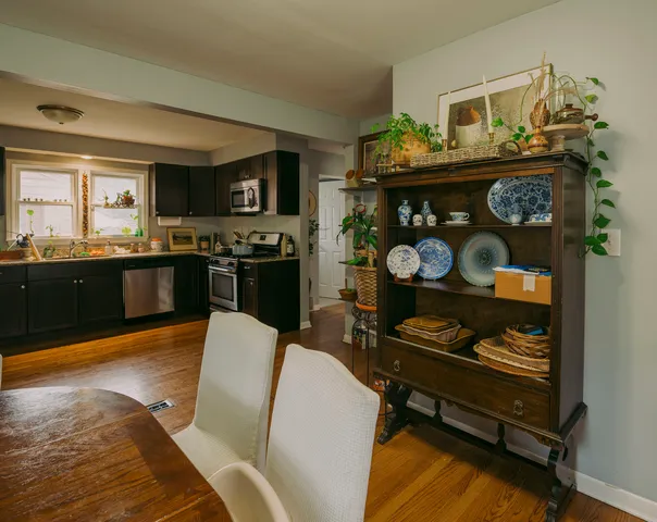 a kitchen with stainless steel appliances granite countertop a stove and a refrigerator