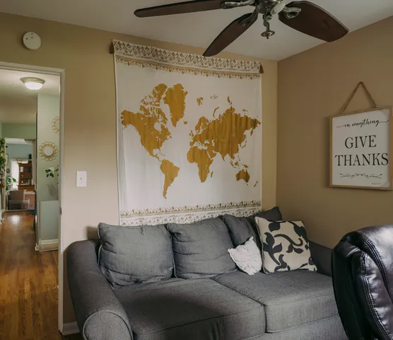 a living room with couch and a table