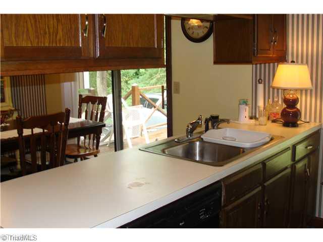 240 Country Club Road Mount Airy, NC 27030 - Photo 11 of 16 Kitchen. Kitchen Open to Dining Room