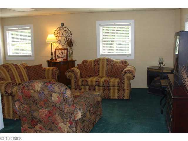 240 Country Club Road Mount Airy, NC 27030 - Photo 15 of 16 Den/Family/Great Room. Sitting Area of Den with Gas Log Fireplace in Corner