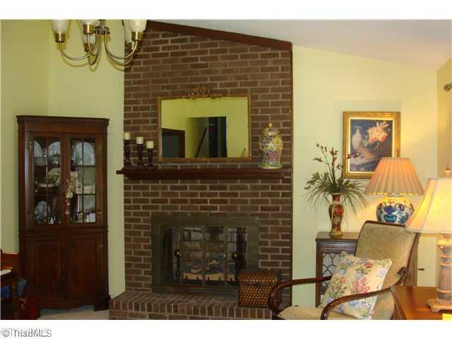 240 Country Club Road Mount Airy, NC 27030 - Photo 7 of 16 Living Room. Living Room with Cathedral Ceiling and Gas Log Fireplace