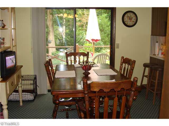 240 Country Club Road Mount Airy, NC 27030 - Photo 9 of 16 Dining Room. Dining Room with Sliders to Back Deck