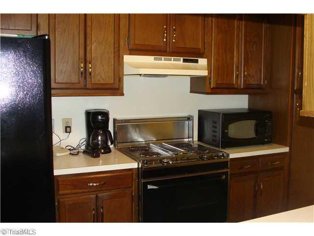 240 Country Club Road Mount Airy, NC 27030 - Photo 10 of 16 Kitchen. Galley Kitchen with JennAir and New Refrigerator