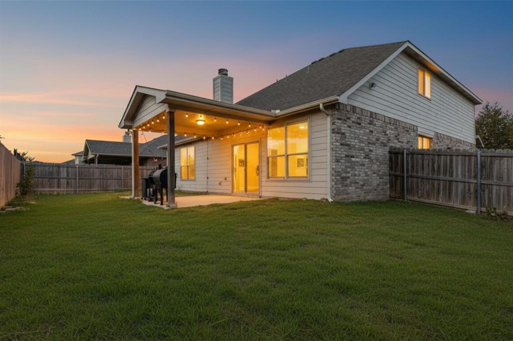 301 Turquoise Drive Fort Worth, TX 76131 - Photo 13 of 33 a front view of a house with a garden