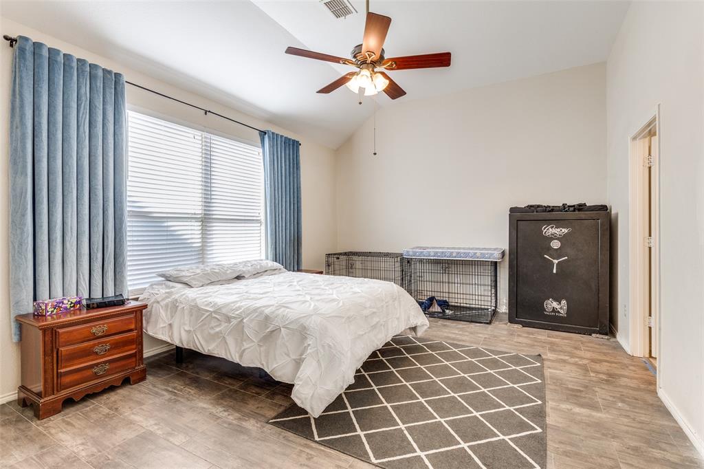 301 Turquoise Drive Fort Worth, TX 76131 - Photo 21 of 33 a bedroom with a bed and a closet