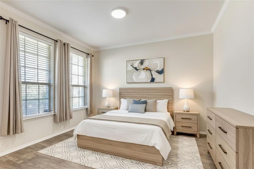 301 Turquoise Drive Fort Worth, TX 76131 - Photo 4 of 33 a bedroom with a large bed and a window