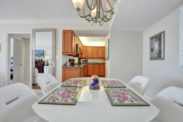 a bedroom with furniture and view of bathroom