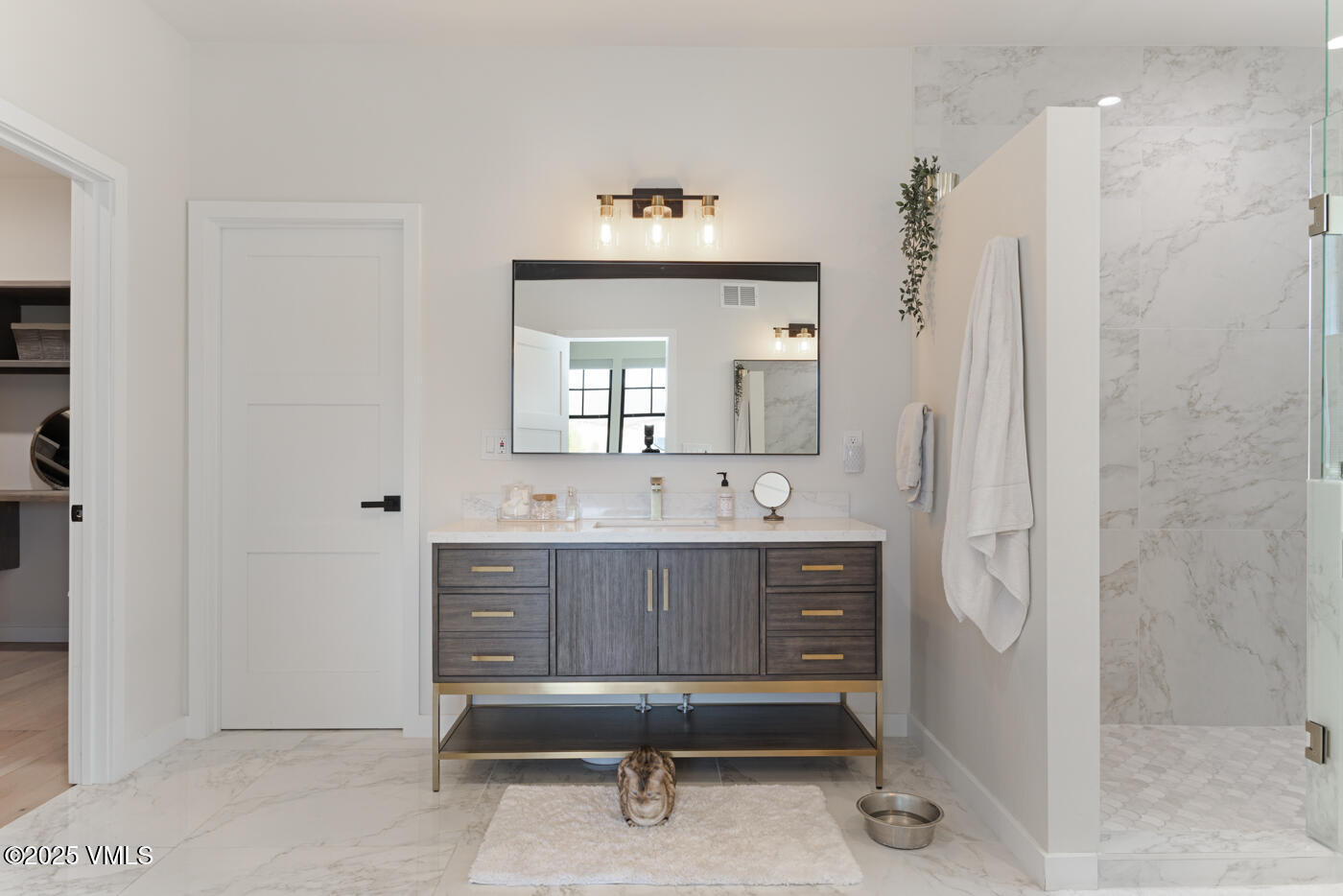 207 Aidan Road Eagle, CO 81631 - Photo 26 of 51 a spacious bathroom with a sink mirror and a shower