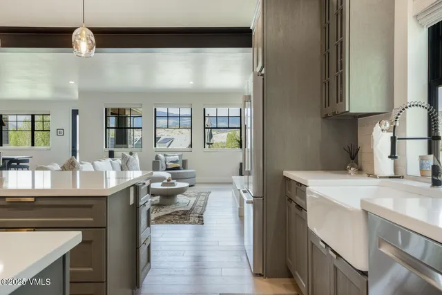 a kitchen with a stove and a sink