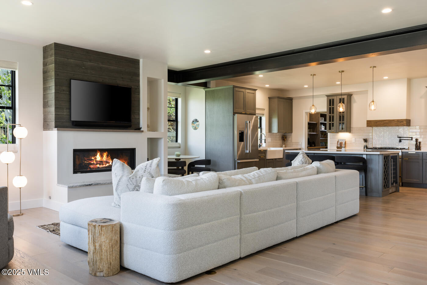 207 Aidan Road Eagle, CO 81631 - Photo 4 of 51 a living room with furniture and a fireplace