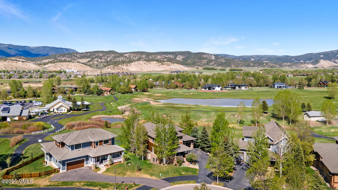 207 Aidan Road Eagle, CO 81631 - Photo 47 of 51 a view of a city with mountains in the background