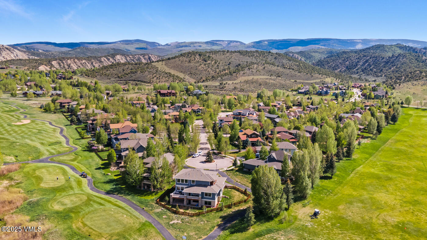 207 Aidan Road Eagle, CO 81631 - Photo 50 of 51 a view of a city with mountains in the background