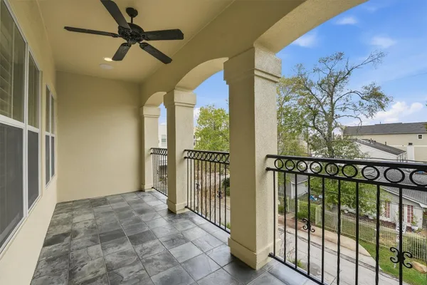 a view of a hallway to a window