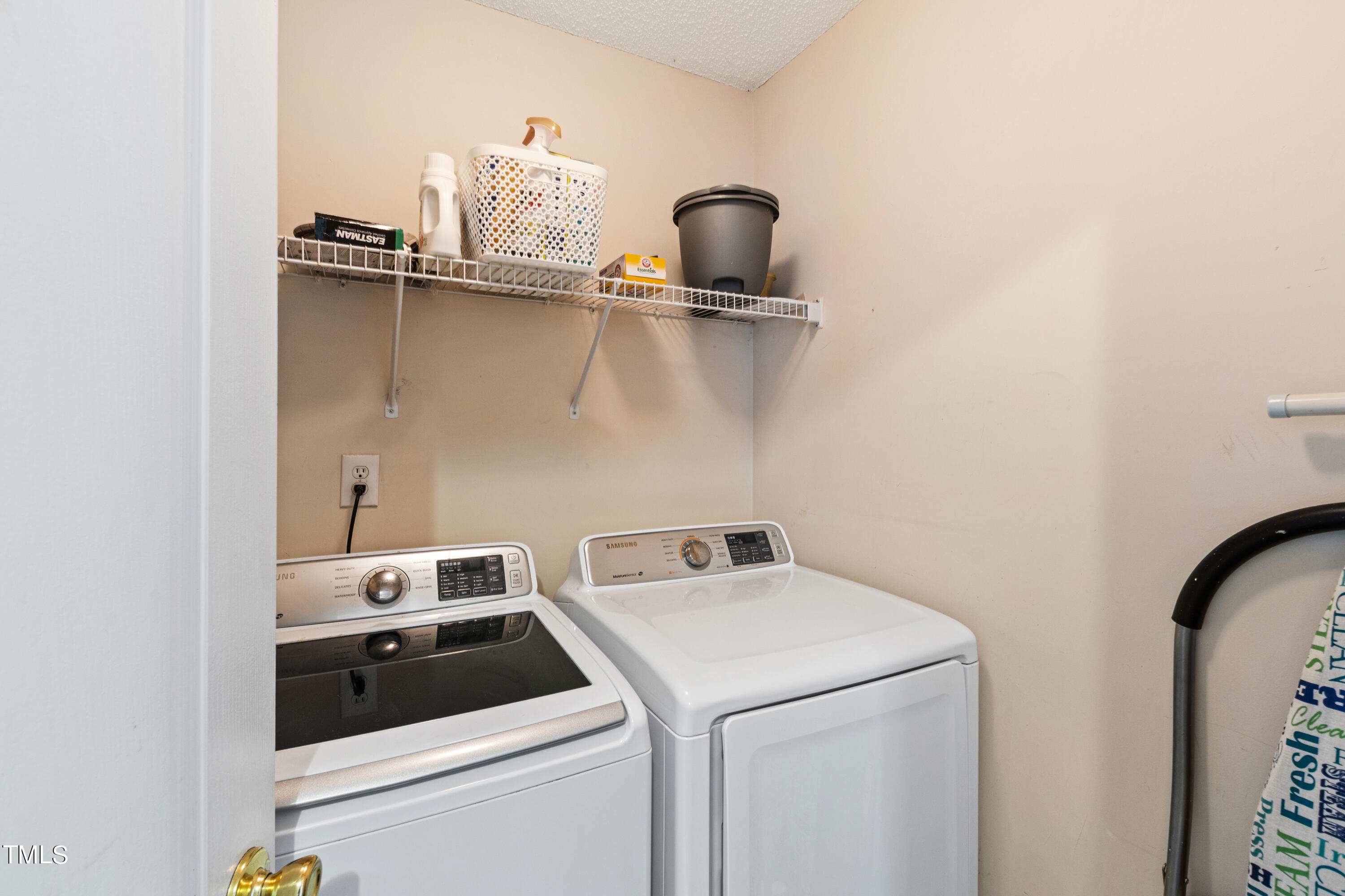 401 New Timber Path Apex, NC 27502 - Photo 35 of 38 a utility room with dryer and washer