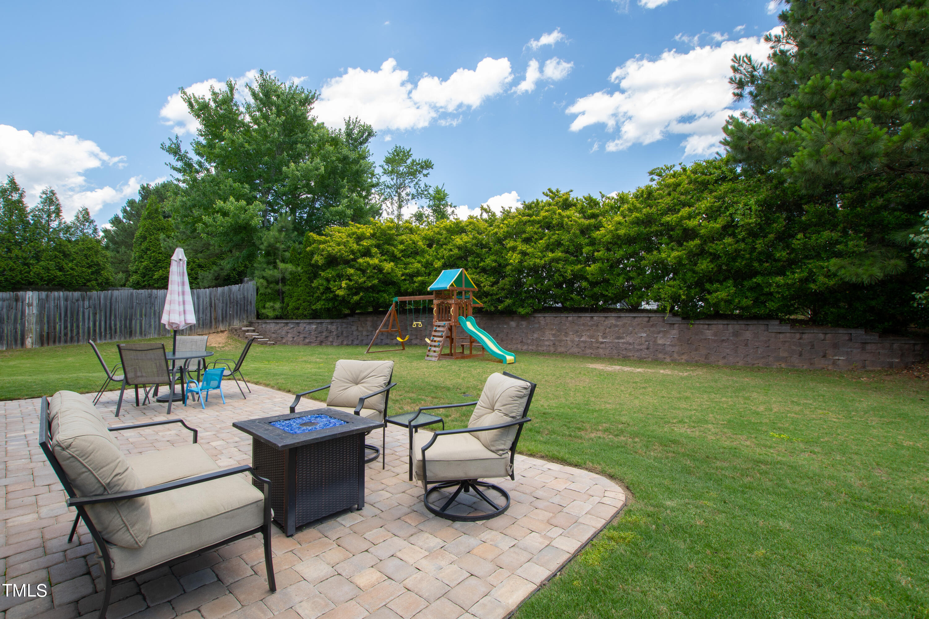 401 New Timber Path Apex, NC 27502 - Photo 38 of 38 a view of a chair and table in the garden