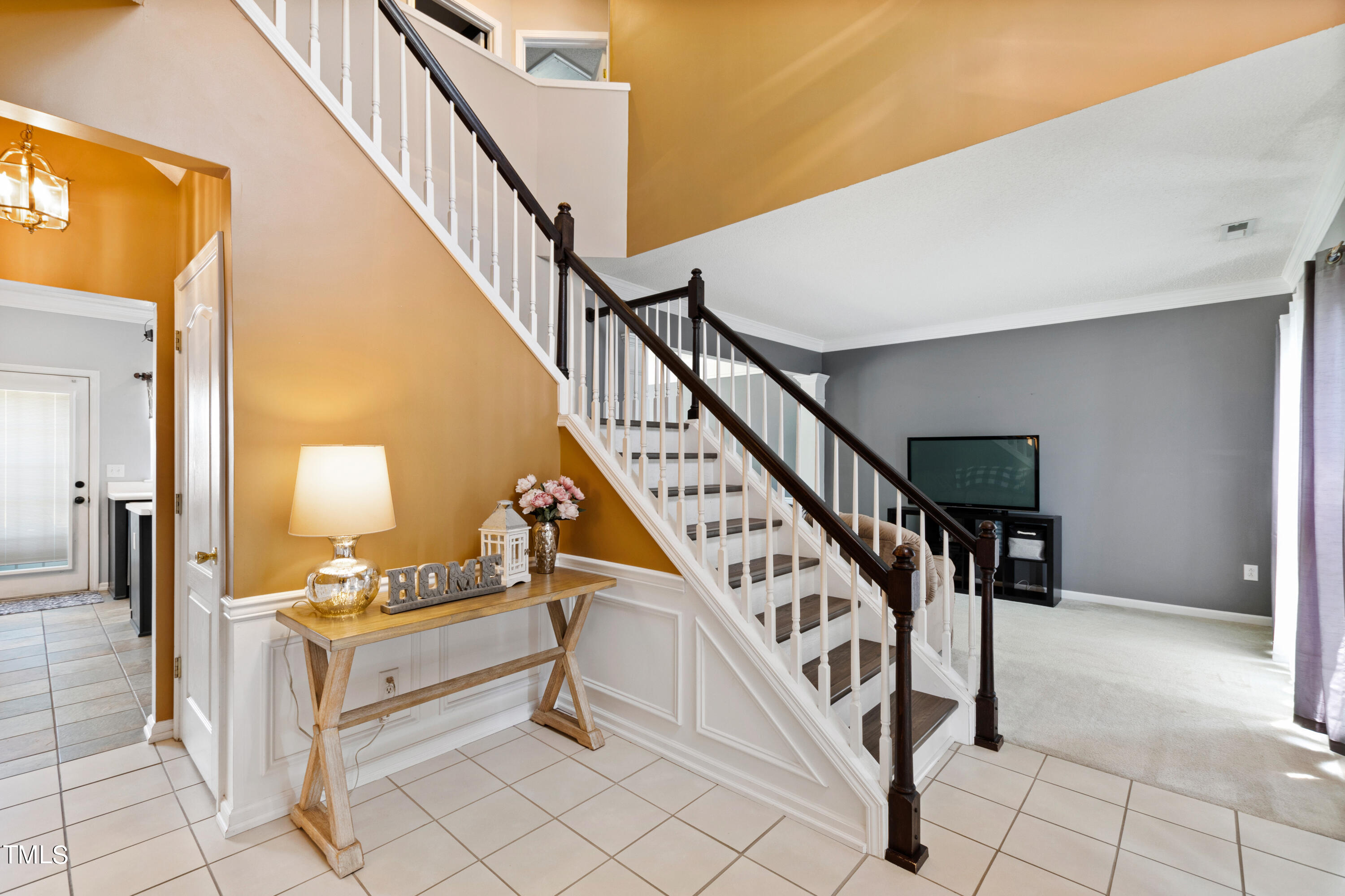 401 New Timber Path Apex, NC 27502 - Photo 4 of 38 a view of entryway and hall