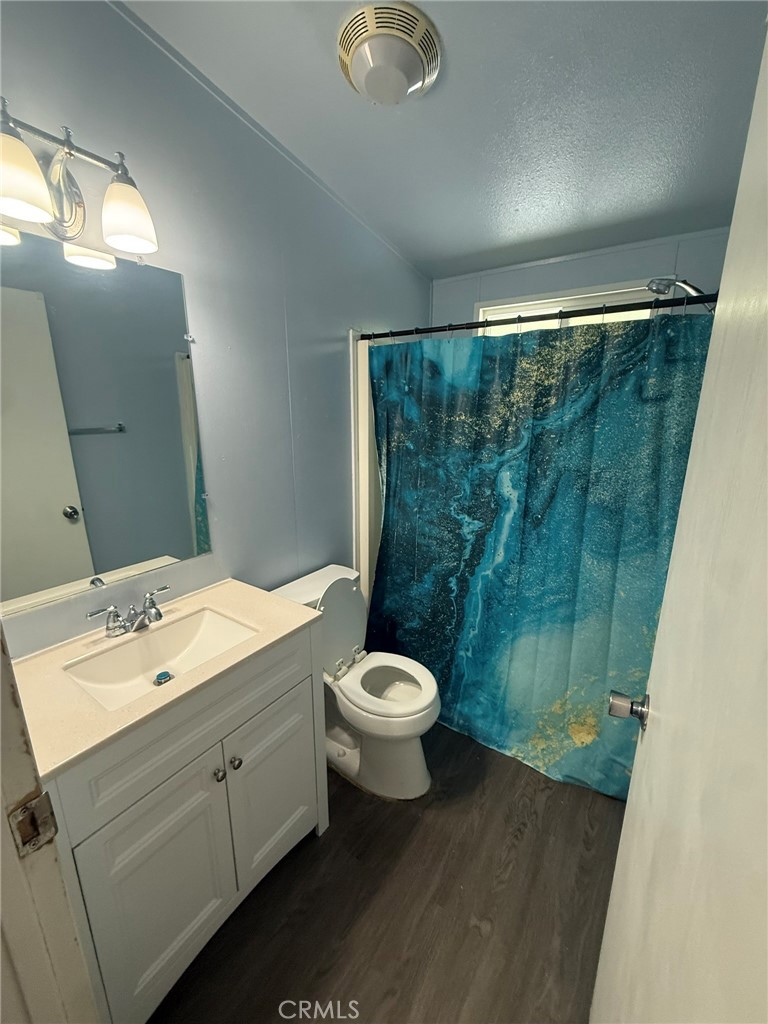 6845 Floyd Way Nice, CA 95464 - Photo 16 of 59 a bathroom with a sink and a mirror