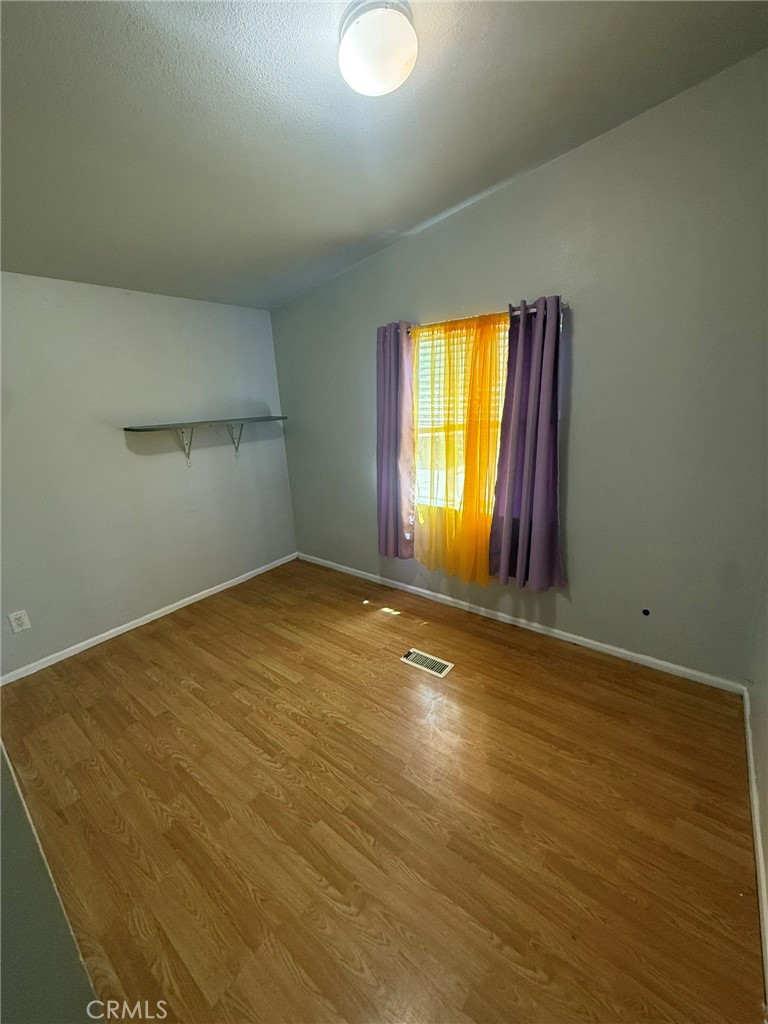 6845 Floyd Way Nice, CA 95464 - Photo 17 of 59 an empty room with a window