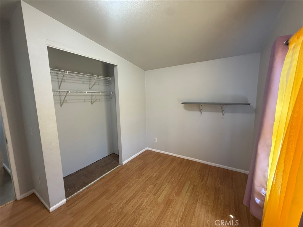6845 Floyd Way Nice, CA 95464 - Photo 18 of 59 a view of an empty room with a window