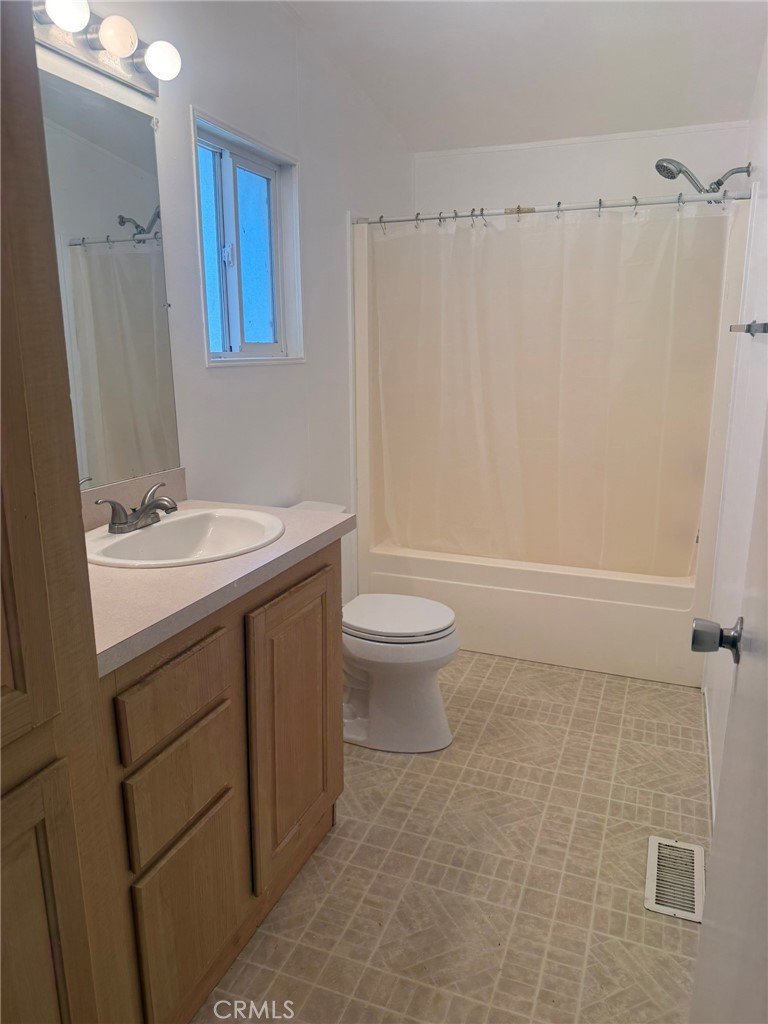 6845 Floyd Way Nice, CA 95464 - Photo 24 of 59 a bathroom with a sink a toilet and shower