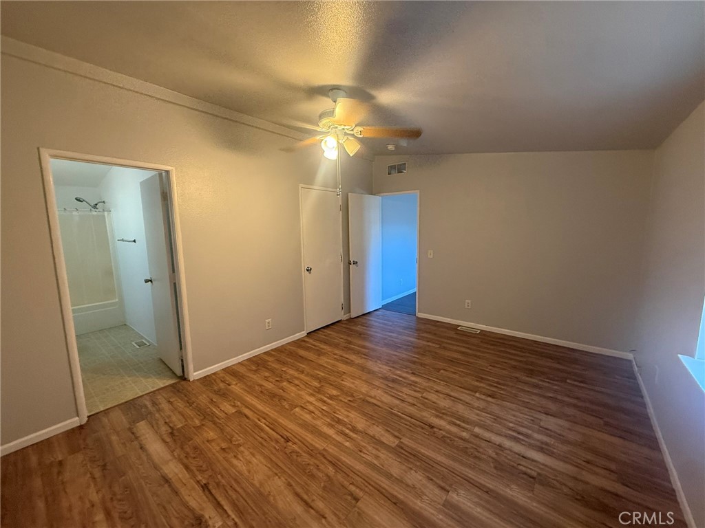 6845 Floyd Way Nice, CA 95464 - Photo 29 of 59 a view of empty room with wooden floor