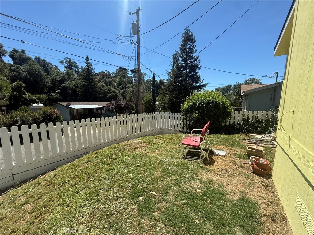 6845 Floyd Way Nice, CA 95464 - Photo 3 of 59 a garden view with a bench