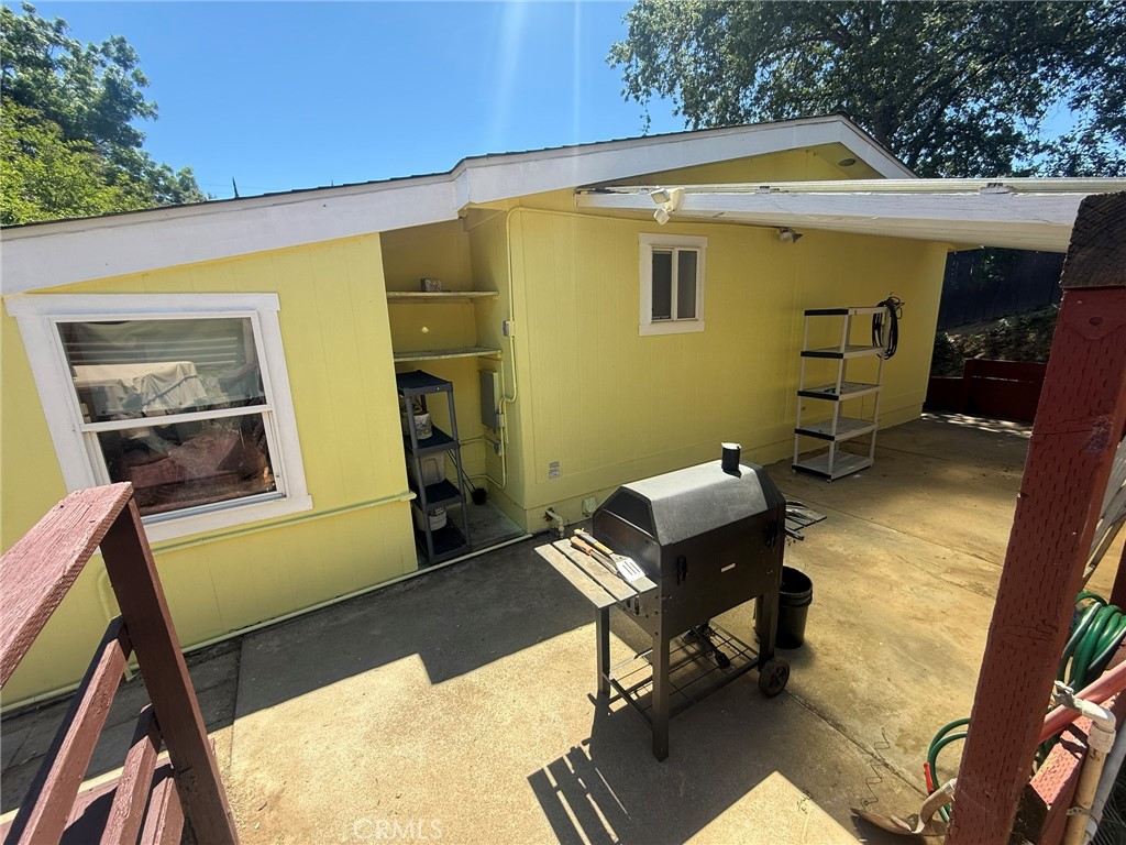 6845 Floyd Way Nice, CA 95464 - Photo 42 of 59 a balcony with table and chairs