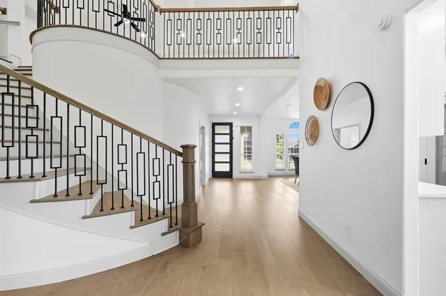 a view of a hallway with entryway