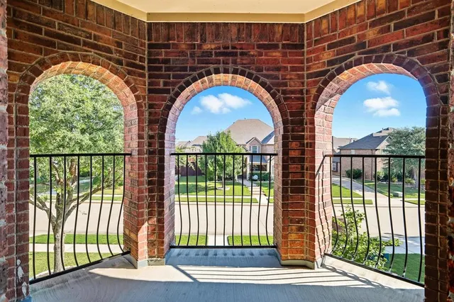 a spacious bathroom with a double vanity sink and a mirror