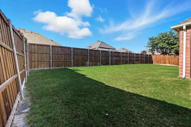 a view of a porch with a backyard