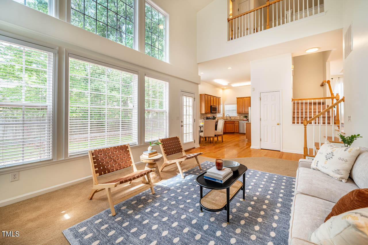 1314 Mallory Lane Durham, NC 27713 - Photo 15 of 47 a living room with furniture and a large window