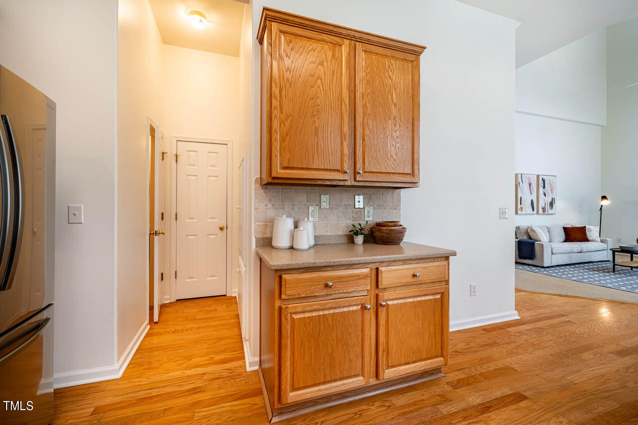 1314 Mallory Lane Durham, NC 27713 - Photo 21 of 47 a view of a kitchen with wooden floor and cabinets