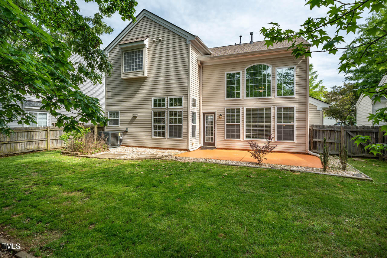 1314 Mallory Lane Durham, NC 27713 - Photo 41 of 47 a front view of a house with a yard and porch