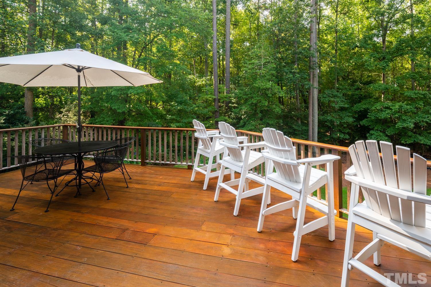 7128 Trenton Ridge Court, Unit 26 Raleigh, NC 27613 - Photo 29 of 30 a view of a chairs and table on the patio