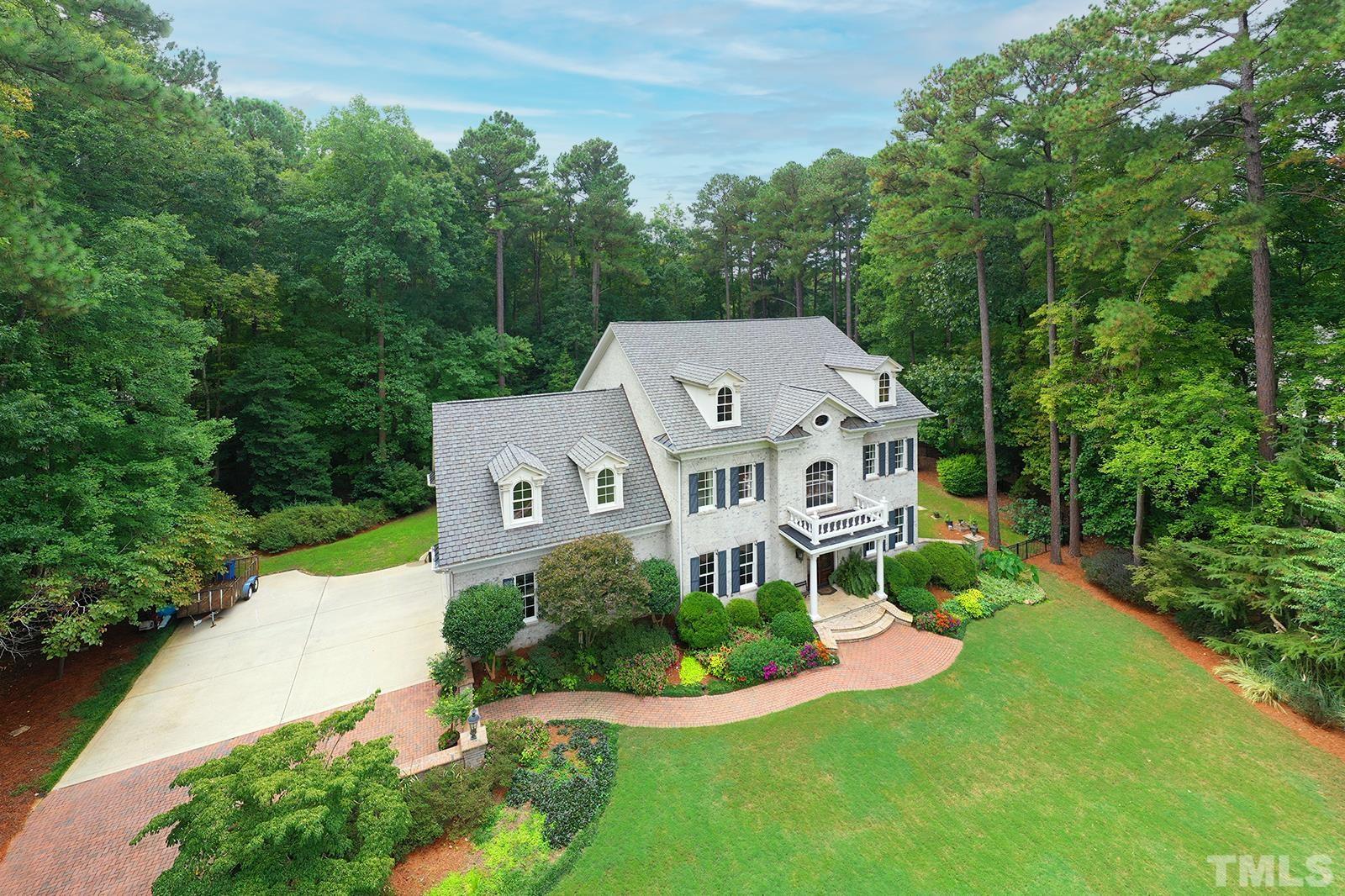 7128 Trenton Ridge Court, Unit 26 Raleigh, NC 27613 - Photo 4 of 30 an aerial view of a house with a big yard