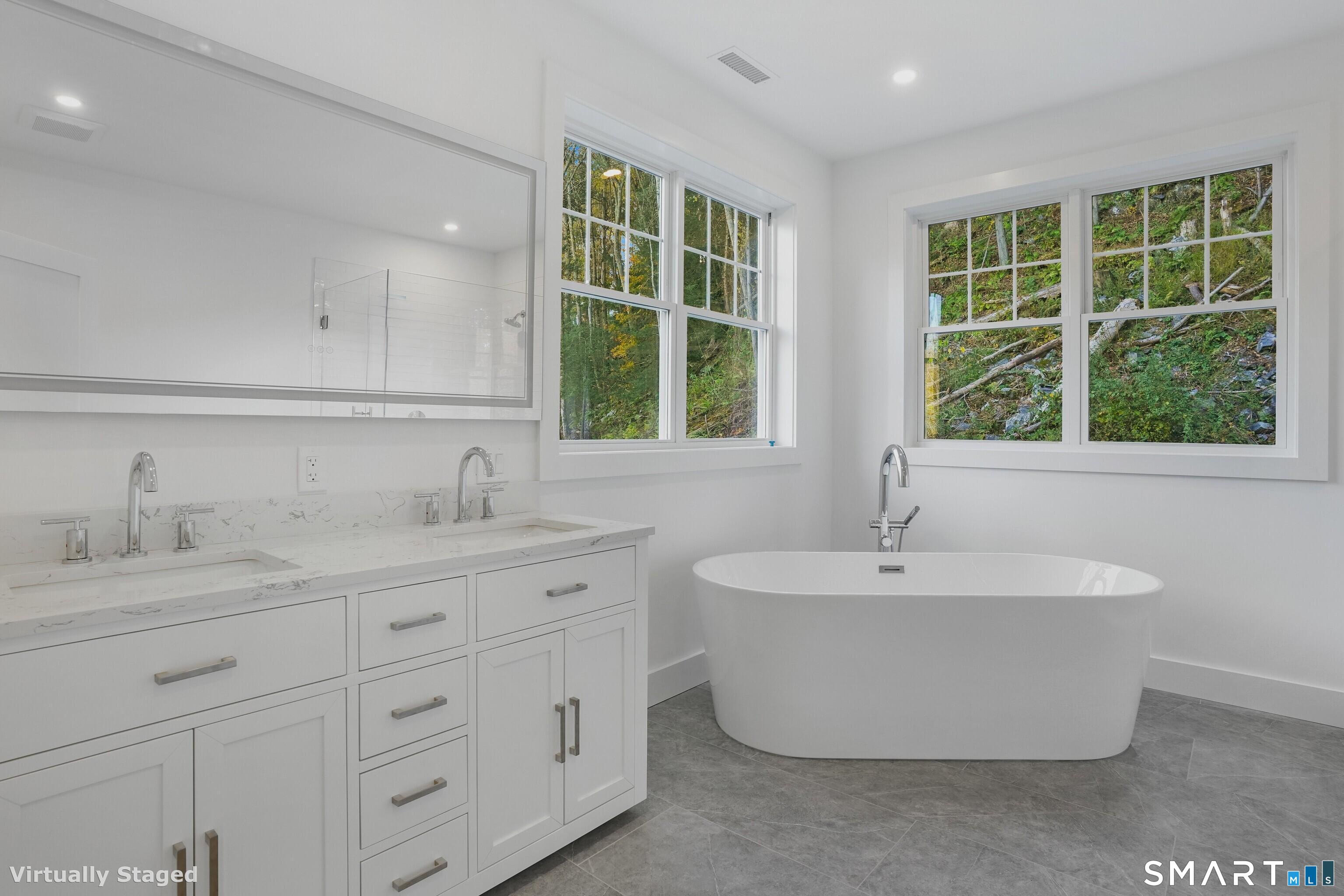 309 South Britain Road Southbury, CT 06488 - Photo 14 of 25 Primary bath with marble counter and large soaking tub
