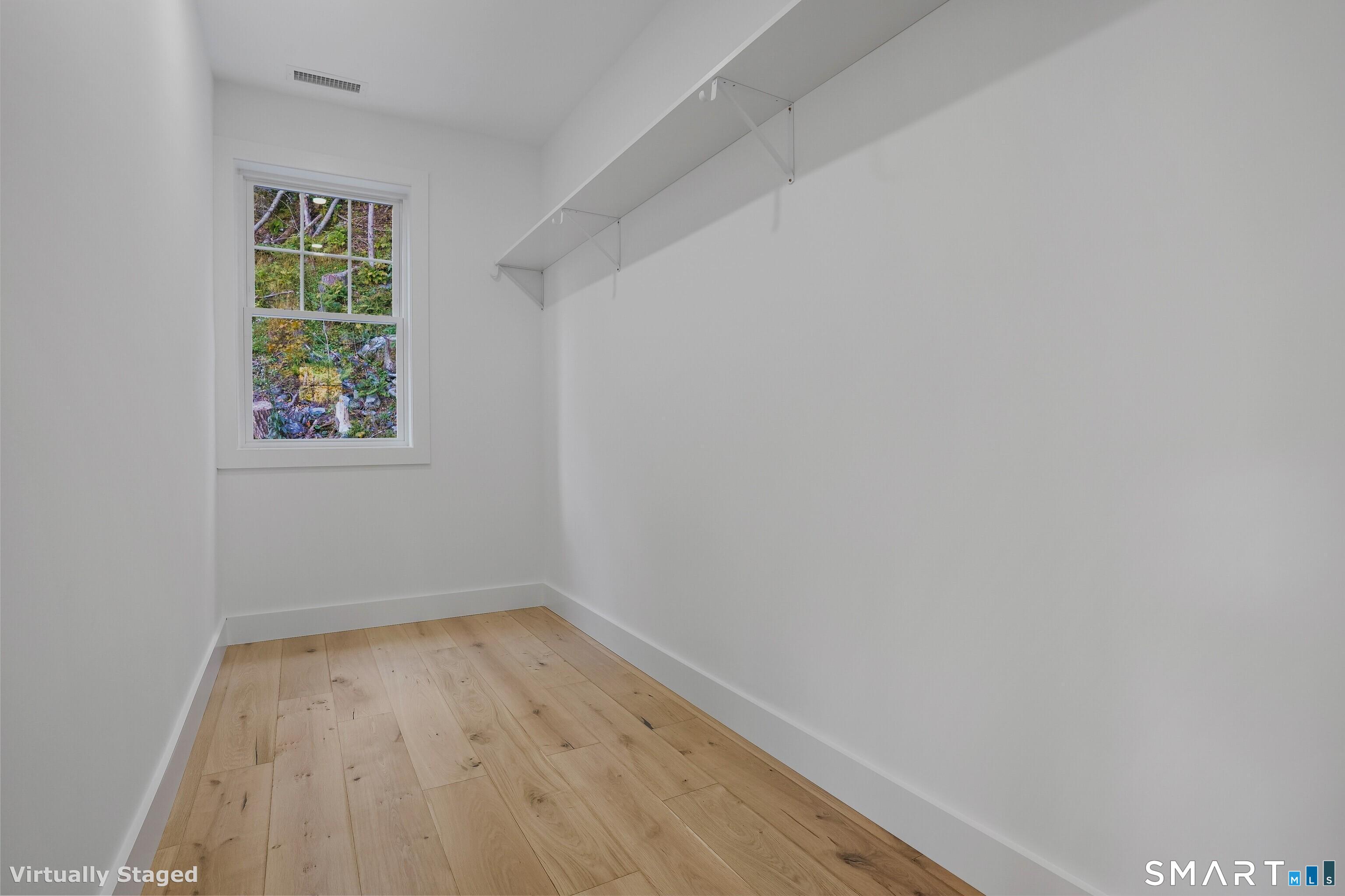 309 South Britain Road Southbury, CT 06488 - Photo 16 of 25 Walk-in closet with the primary bedroom