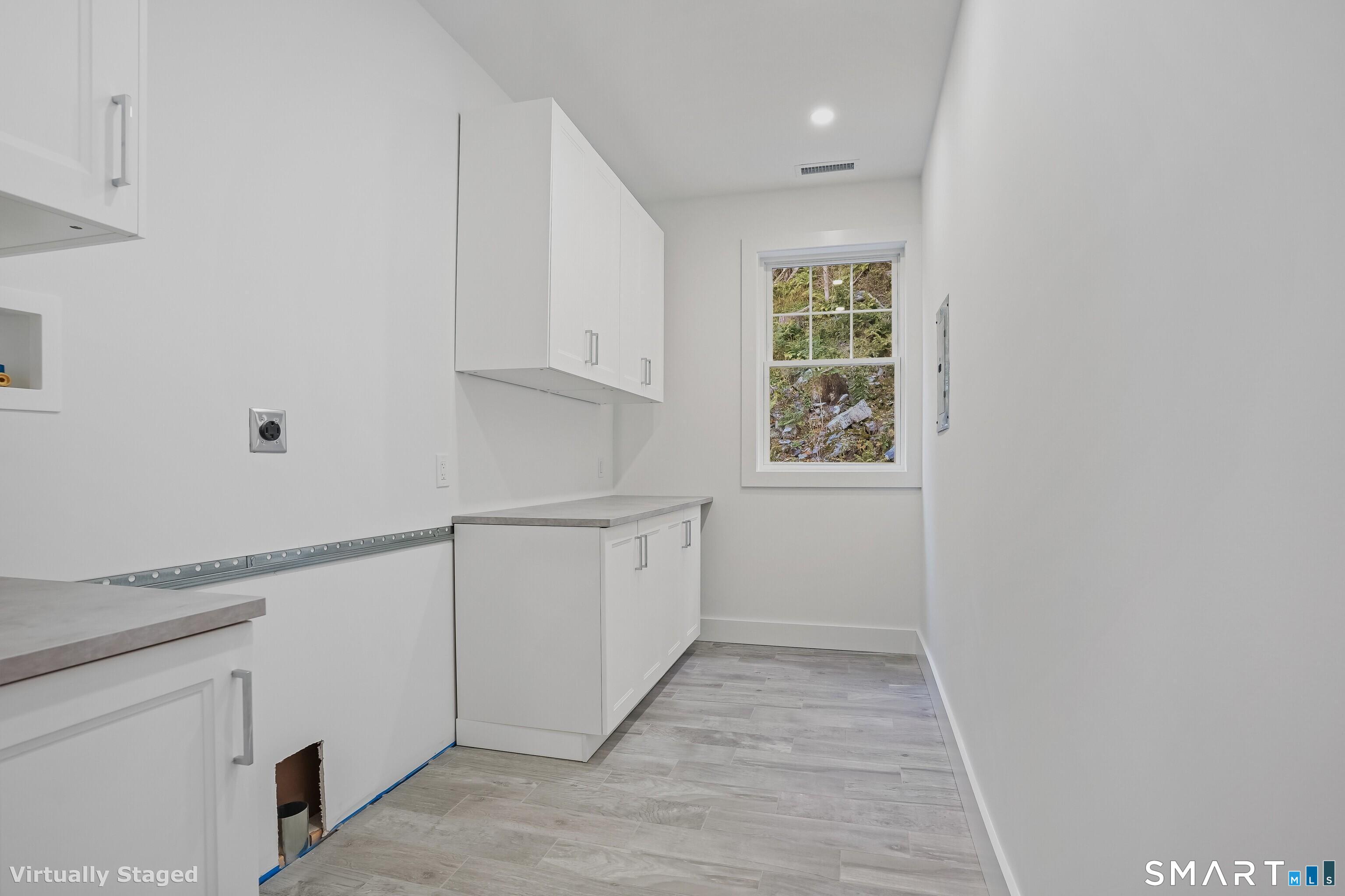 309 South Britain Road Southbury, CT 06488 - Photo 22 of 25 Convenient laundry on second level