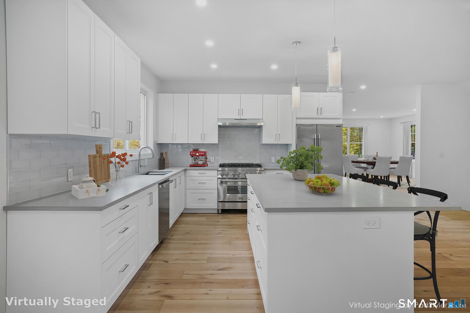 309 South Britain Road Southbury, CT 06488 - Photo 7 of 25 Abundant cabinet space and stainless appliances in the spacious kitchen