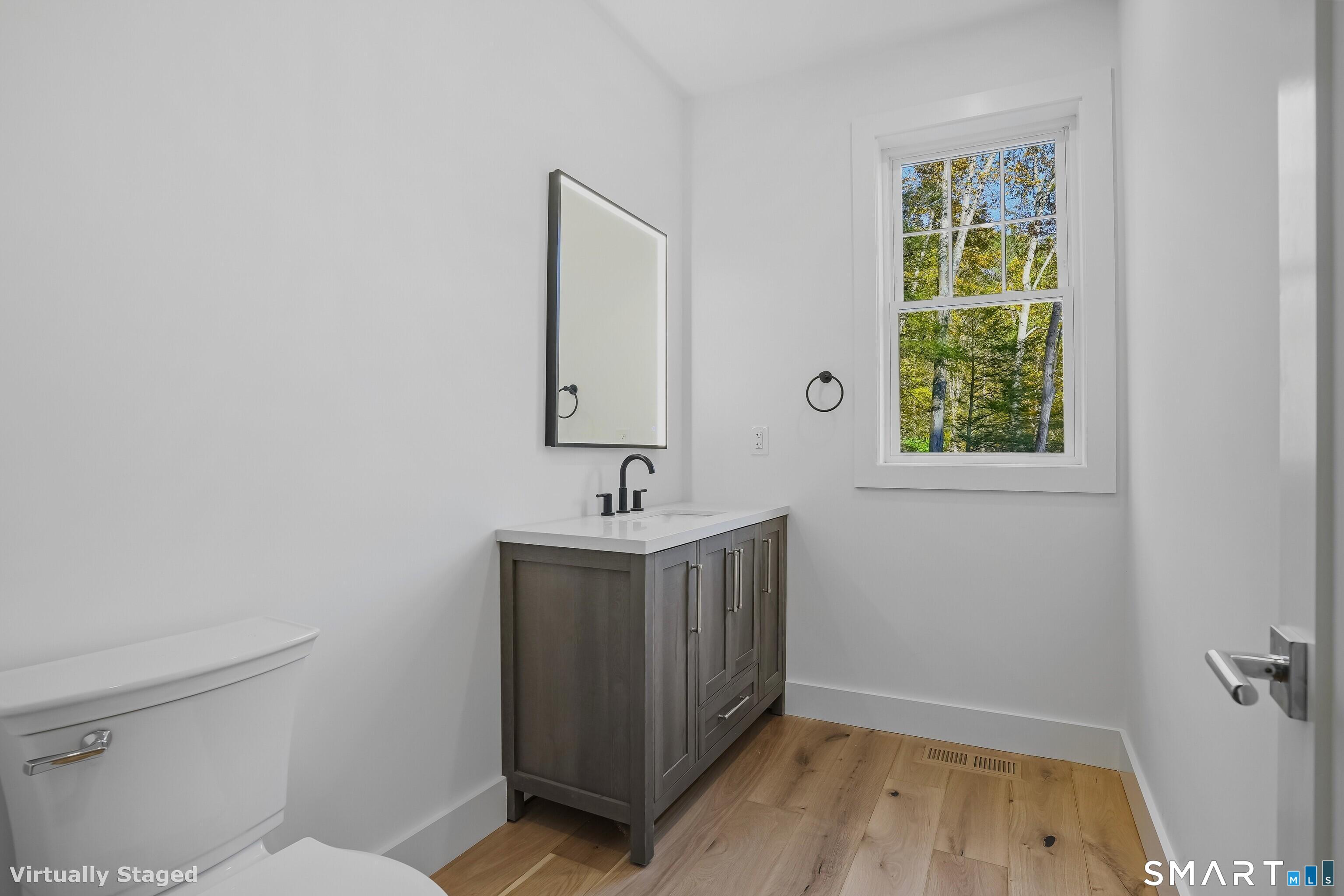 309 South Britain Road Southbury, CT 06488 - Photo 10 of 25 Half bath on main level